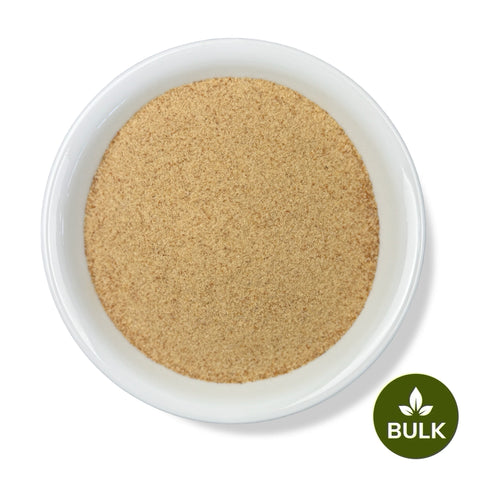 A bowl of Psyllium Husk Powder, with a green logo indicating the product is sold in bulk.