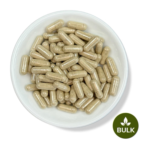 A bowl full of brown capsules with a 'BULK' label at the bottom