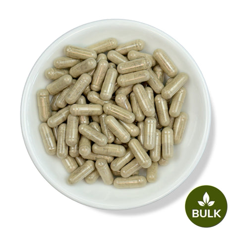 A white bowl filled with brown capsules, with a 'BULK' label at the bottom right corner.