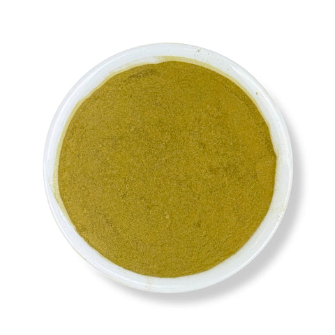 Fine greenish-brown Senna Leaf Powder (Hoja Sen en Polvo) displayed in a white bowl.