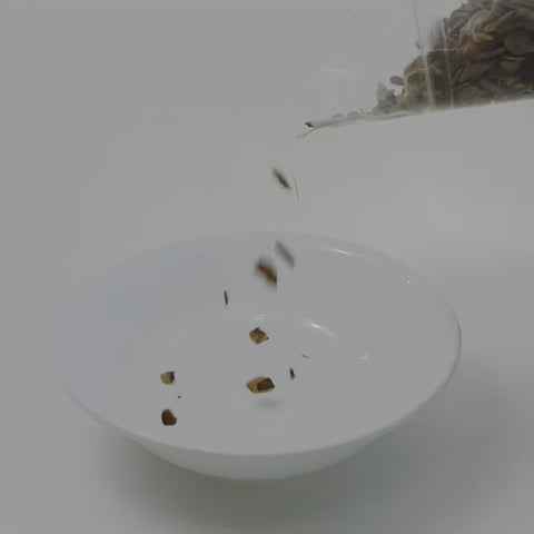 Video of a bowl filled with cut and sifted Cascara Sagrada