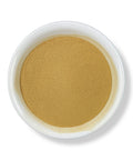 A bowl filled with Hops Powder against a white background.