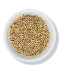 A bowl filled with cut and sifted Ashwagandha Root.