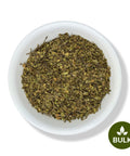 A white bowl filled with dried Chaparral (Larrea tridentata) leaves, on a plain background, with a 'BULK' label in the lower right corner.