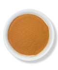 A bowl of Cinchona Bark Powder on a white background.