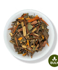 A variety of dried herbs and spices构成的 tea blend, including pieces of sarsaparilla, cuachalalate, and muicle, displayed in a white bowl with a 'BULK' label in the lower right corner.