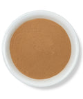 A bowl of Cocolmeca Bark Powder against a white background.