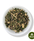 A white bowl filled with dried leaves and stems of Cordoncillo Negro (Matico), with a green logo indicating the product is for sale in bulk.