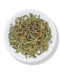A plate full of dried dandelion leaves.