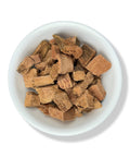A bowl filled with dried Encino bark pieces.