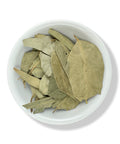 A bowl filled with eucalyptus leaves.