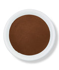 A bowl of Tepezcohuite tree bark powder against a white background.