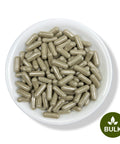 Muicle herbal capsules in a white bowl with a bulk label icon