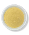 A bowl of yellow Quassia powder on a white background.