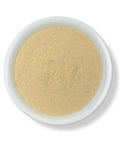 A bowl of Wereke Powder (Ibervillea sonorae) on a white background.