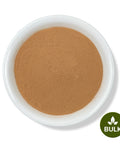 A white bowl filled with brown Cocolmeca Bark Powder on a white background, with a 'BULK' label in the lower right corner.