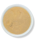 A bowl filled with fine ground Maca Root Powder.