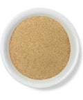 A bowl of Psyllium Husk Powder against a white background.