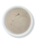 A bowl of Irish Sea Moss Powder on a white background.