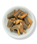 A bowl containing dried botanicals known as Palo 3 Costillas, which are used for various health benefits.