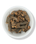 A bowl containing dried Black Sarsaparilla roots.