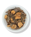 Dried taray herb pieces in a white bowl on a white background.
