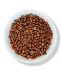 A bowl filled with dried Uva Ursi (Pinguica) fruit berries.