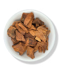 A bowl containing dried pieces of Cocolmeca bark.
