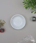 Video of Evergreen Herbs  dried red rose buds being displayed in a pouch and poured out into a bowl