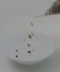 Video of a bowl filled with cut and sifted Cascara Sagrada